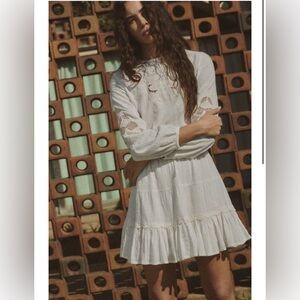 zara cream eyelet mini dress with ruffled skirt embroidered